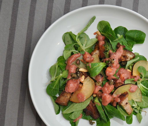 Mâche Salad with Pork Belly Lardons, Crispy Capers, Pine Nuts, and Plum Agrodolce Dressing Recipe | 