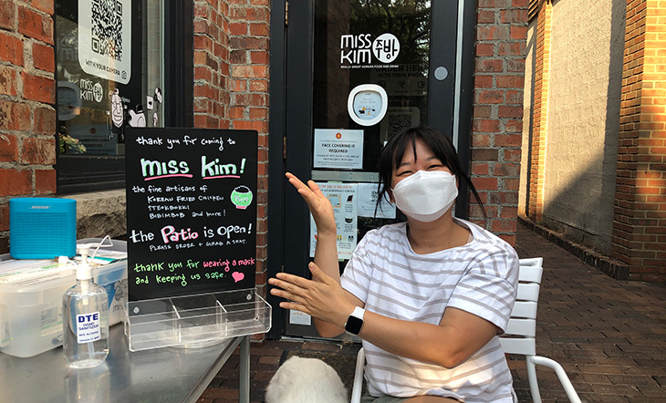 Ji Hye Kim at Miss Kim's sanitation station photo Katie Jozwiak